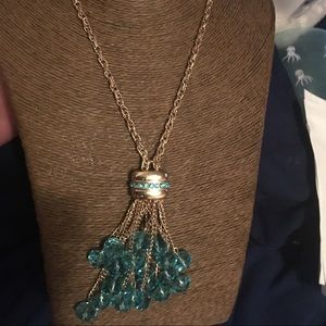 Gold rope necklace with light blue beads